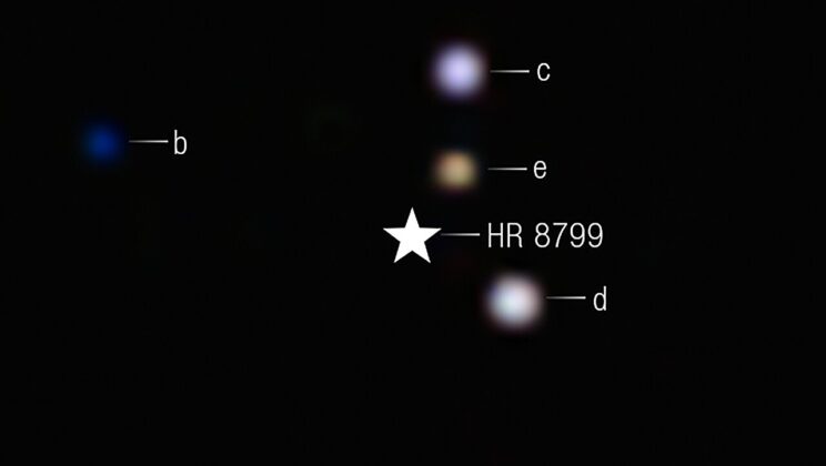 James Webb Space Telescope Captures Direct Carbon Dioxide Images in Distant Planetary System HR 8799