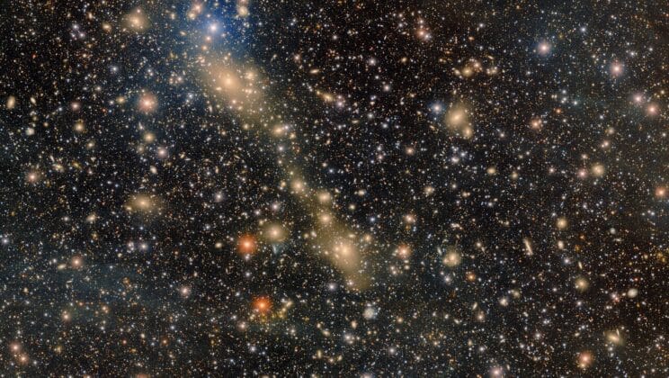The Ghostly Light Between Galaxies Reveals a Hidden History of Cosmic Collisions