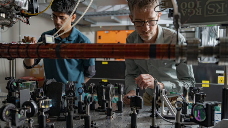 Massive Helium Atoms Caught Existing in Two Places at Once