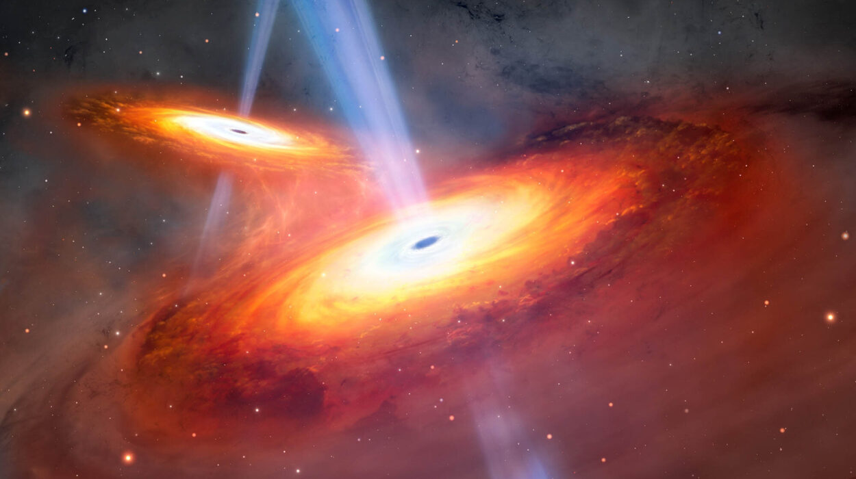 Ancient Quasar Twins Caught Merging Only 900 Million Years After the Big Bang