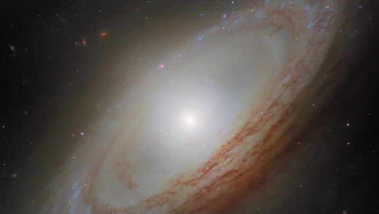 This spiral galaxy’s center rotates at a right angle to its outer disk